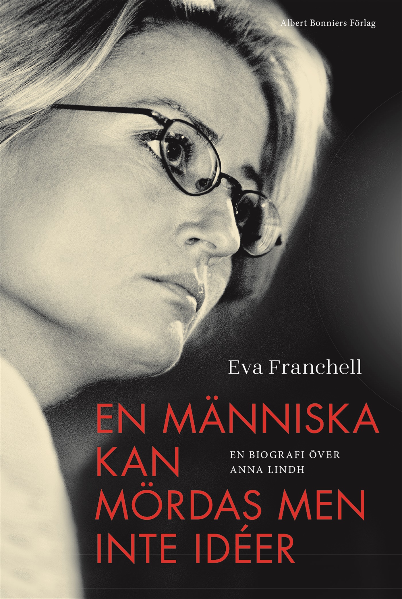 Omslag: En människa kan mördas men inte idéer : en biografi över Anna Lindh